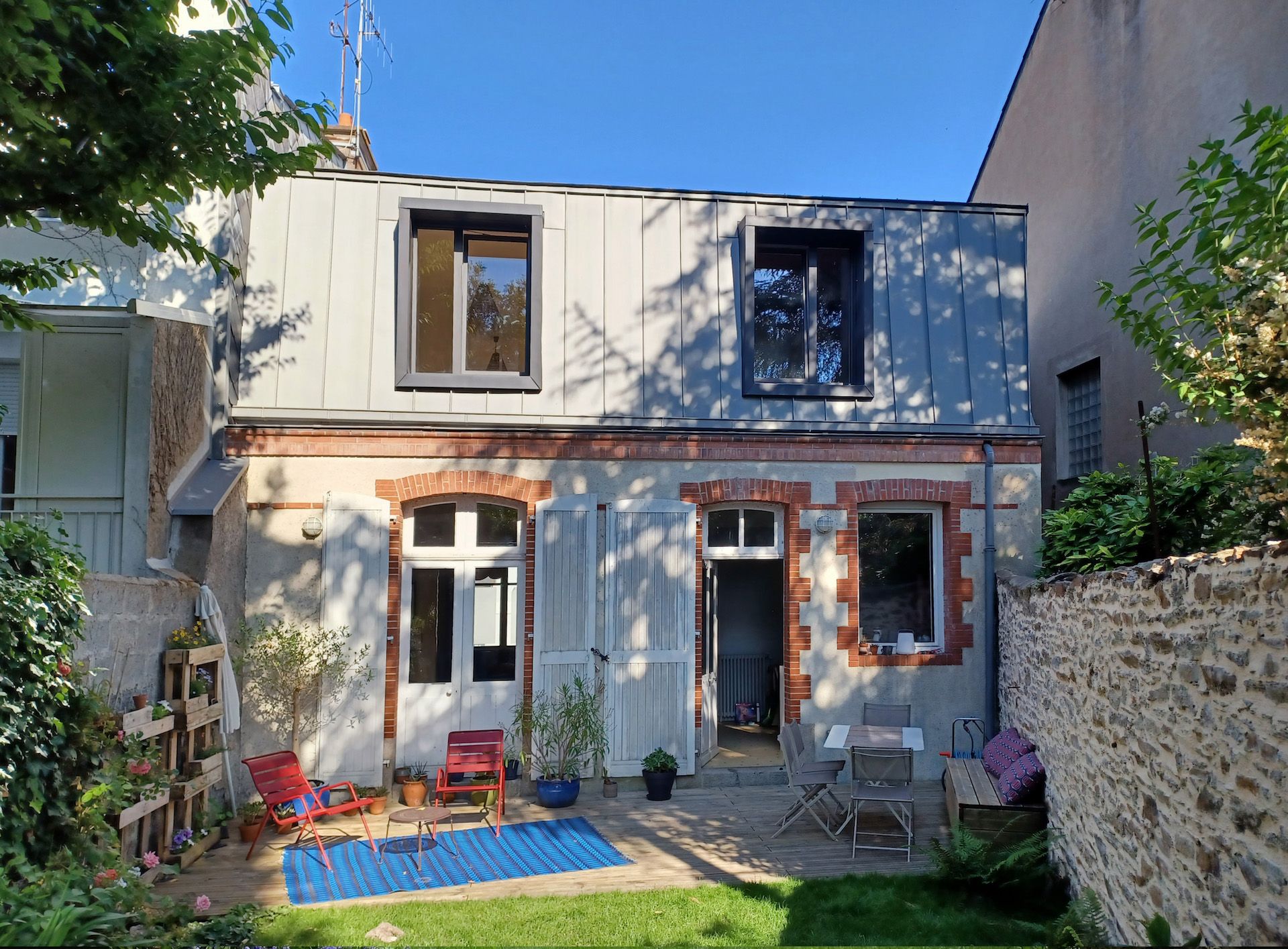 surélévation zinc d'une maison